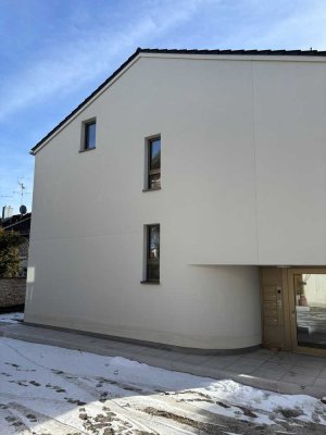 Luxuriöse 2-Zimmer Erdgeschosswohnung mit Terrasse und Garten in zentraler Lage