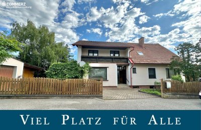 Mehrfamilienhaus mit Weinlaube und Gartenhäuschen!