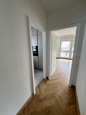 Hochwertig kernsanierte 3-Zi.-Wohnung mit Westbalkon am Lohrberg