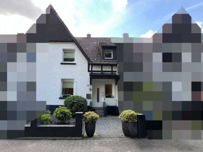 Modernisiertes Reihenmittelhaus mit pflegeleichtem Garten und Garage in ruhiger Wohnlage!