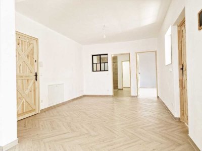 EG Wohnung mit Terrasse | NACHHALTIGSTE Immobilie Wolfsburgs, Lehmbau, PV - Autarkie, Appsteuerung