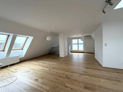 Erstbezug nach Renovierung: Helle Maisonette mit 2 Terrassen in attraktiver Lage