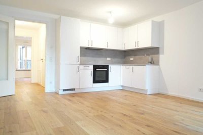 Neubau-Maisonette-Wohnung mit 2 Zimmern und Terrasse in München