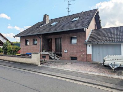 Familienidylle pur: Einfamilienhaus mit großem Grundstück