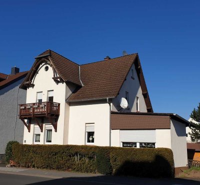Lichtdurchflutete Wohnung  mit Gartenanteil u. Garage