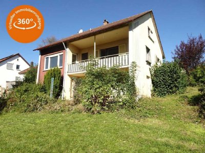 "Einfamilienhaus mit Potential und großem Grundstück"