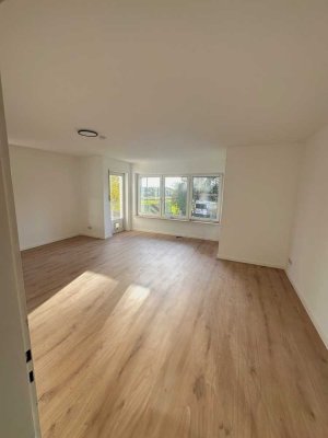 Großzügige, sanierte 3-Zimmer Wohnung mit Terrasse und Garten