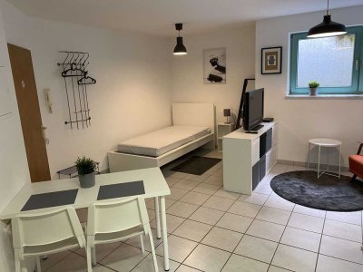 Zentral gelegene möbilierte 1,5 -Zimmer-Wohnung mit Stellplatz/Carport in Filderstadt-Bonlanden
