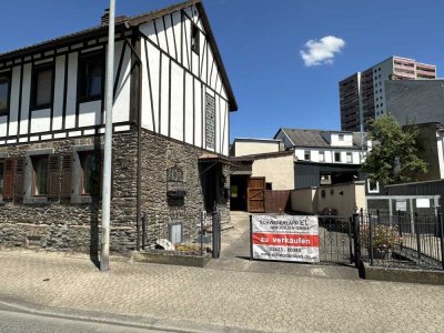 Solides Einfamilienhaus am Stadtrand – Haus mit Historie und Garten
