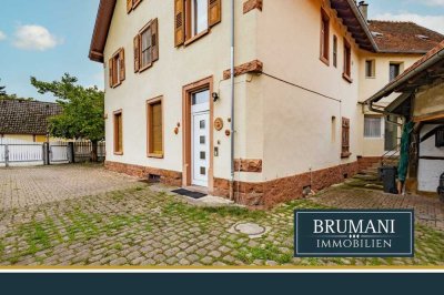 BRUMANI | Stilvolles Zweifamilienhaus mit großzügiger Gewerbeeinheit in Schwanau-Ottenheim