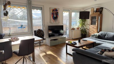 Mauer "Licht. Ruhe. Effizienz. Stilvolle Maisonette mit Südterrasse" | ZELLMANN IMMOBILIEN