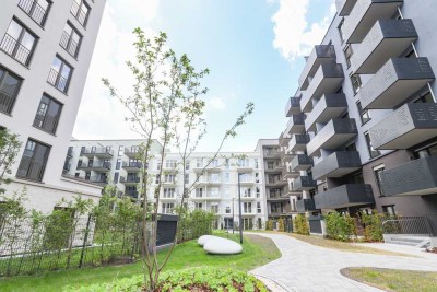 Terrassengenuss und modernes Ambiente: stilvolle Erdgeschosswohnung mit hochwertiger Einbauküche