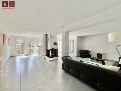 Wohnen mit Wohlfühlfaktor: Freistehendes Einfamilienhaus mit TG, Garten und Dachterrasse