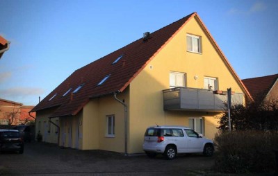 Traumhafte 2 Zimmer Maisonette-Wohnung mit Balkon & Gartenanteil
