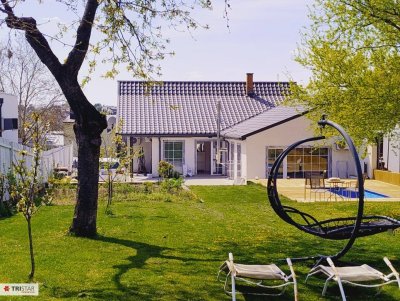 Top-ausgestattetes Wohnhaus mit gepflegtem Garten