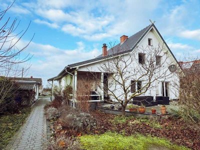 Einfamilienhaus mit Blick auf exklusive Reitanlage