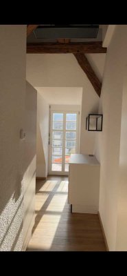 Einzigartiger Charme im Denkmal – helle DG-Wohnung mit Traumterrasse in Kollnau