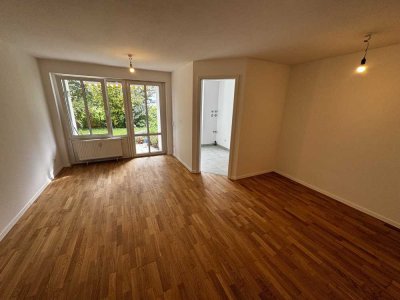 Charmante 2-Zimmer-Wohnung mit großem Garten in zentraler Lage von Gilching