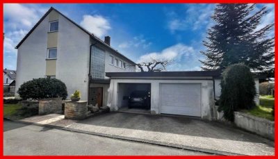 Zweifamilienhaus mit weitläufigem Grundstück
