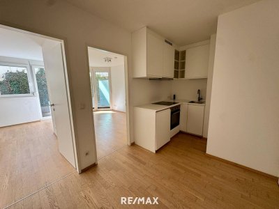 Moderne, neuwertige 2-Zimmer-Wohnung mit Terrasse und Garten