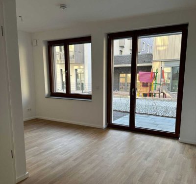 ERSTBEZUG! Lichtdurchflutete Wohnung zum Verweilen mit Garten