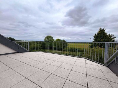 Sonnige Dachgeschoss-Maisonette mit Weitblick und Kamin