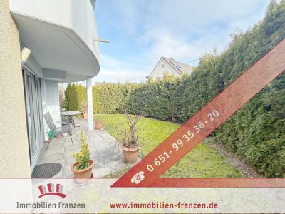 Neuwertige, energieeffiziente 3-ZKB-Wohnung mit Terrasse, Garten und Tiefgaragenstellplatz