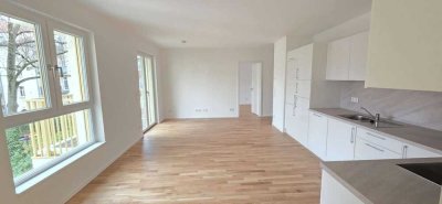 Hochwertiger Neubau mit Parkett, Balkon und ebenerdiger Regendusche!