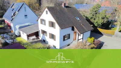 Solides Einfamilienhaus mit Südgarten und Garage in bevorzugter Wohnlage