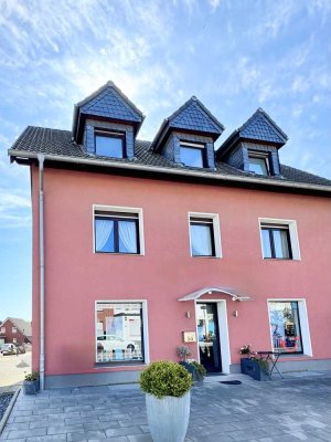 Wohn-Geschäftshaus mit 3 Einheiten + Einfamilienhaus in zentraler Lage von Rommerskirchen
