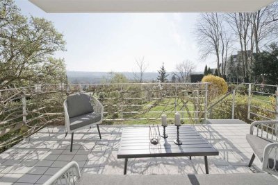 Großzügige 5,5-Zimmer-Wohnung mit zwei Balkonen und Garten im Dachswald
