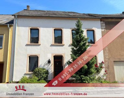 Wohnen mit Freiraum – Haus mit Traumgarten, Terrasse, Balkon & Garage in Konz-Könen
