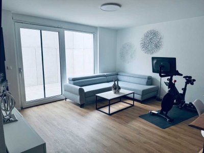 UG-Wohnung mit drei Zimmern und Terrasse