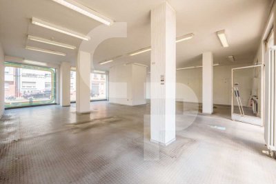 EG-Fläche mit Wohnperspektive – Hohe Decken & Fensterfront