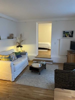 2-Zi Einliegerwohnung mit separatem Eingang und kleinem Garten