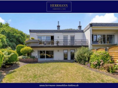 Familienfreundlicher Bungalow in schöner Reihenendlage mit Garten, Garage und Weitblick