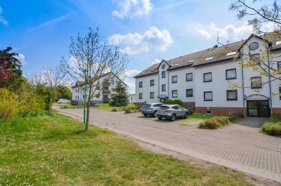 Langenbogen: Helle, komfortable 3-Zimmer-Wohnung mit großem Südbalkon und EBK