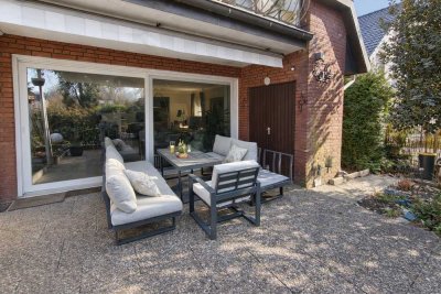 Großzügige Erdgeschosswohnung mit ca. 30 m² Süd-West-Terrasse, Garage und Haus-im-Haus-Charakter