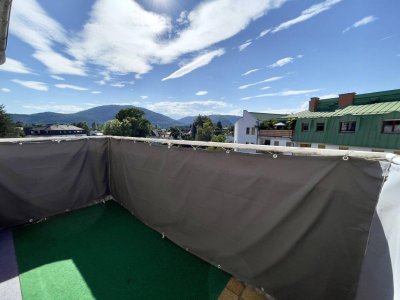 Hofseitige Wohlfühloase mit Balkon &amp; Bergblick – ruhig gelegen, zentral erreichbar!