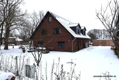 Neuwertige 3-Zimmer-Erdgeschoss-Wohnung mit Terrasse und Gartenanteil