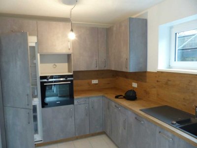 3-Zimmer Souterrainwohnung mit Terrasse und Garten in Mommenheim