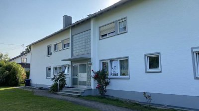 Helle, attraktive 4-Zimmer-Wohnung im 1. OG mit Gartenanteil und Einzelgarage