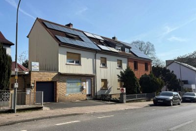 Mehrfamilienhaus mit Ladeneinheit und Entwicklungspotenzial auf großzügigem Grundstück in Frankfu...