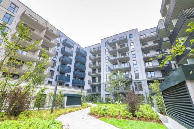 Penthouse-Genuss mit sonnigem Balkon und moderner Wohnküche – stilvoller Lebensraum über den Dächern