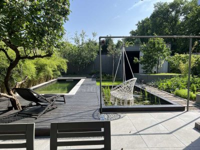 Exklusives Einfamilienhaus mit Naturpool, Sauna und außergewöhnlicher Architektur!