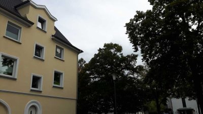 Moderne 3-Zimmerwohnung mit große Wohnküche, Ausgang zum Hof + Einzelgarage
