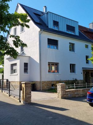 Helle DG-WE mit Balkon in bester Lage, Erstbezug nach aufwendiger  Sanierung