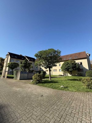 Charmante Dachgeschosswohnung in ruhiger Lage mit Tiefgaragenstellplatz – langfristig vermietet