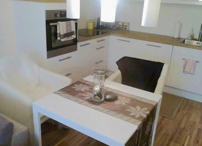 2 Zimmer- Erdgeschosswohnung mit Garten und Garage