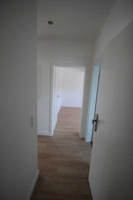 Erstbezug nach Sanierung: Stilvolle 2,5-Raum-Dachgeschosswohnung mit geh. Innenausstattung